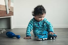 Baby playing (Common Mistakes Stay-at-home Moms make )